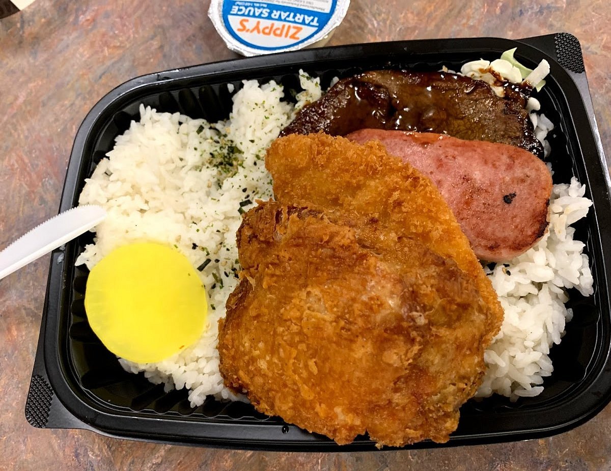 Zippy's signature dishes Zip Pac (Fried chicken, teriyaki beef, Spam, fried fish over rice)ChiliSaiminApple Napple (Turnover)﻿﻿﻿